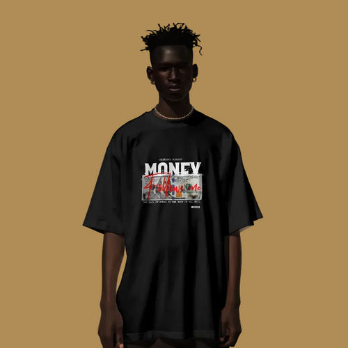 Person wearing a black t-shirt with graphic design against a textured wall.